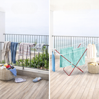 Stainless steel foldable clothes drying stand with towels and garments on a balcony, space-saving laundry rack for home use Qatar