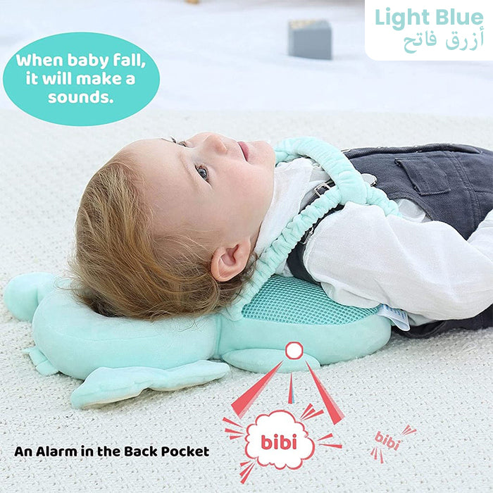 Light blue baby head protector pillow with built-in alarm in back pocket, emits sound if baby falls