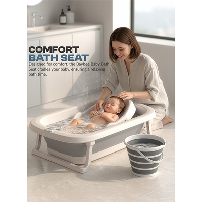 Baby relaxing in foldable bathtub with bath seat during indoor bath time in Qatar