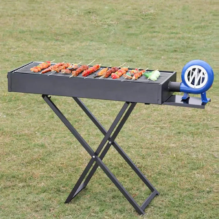 Compact grill and charcoal barbecue grill ideal for outdoor cooking and camping, available at Homesouq Qatar
