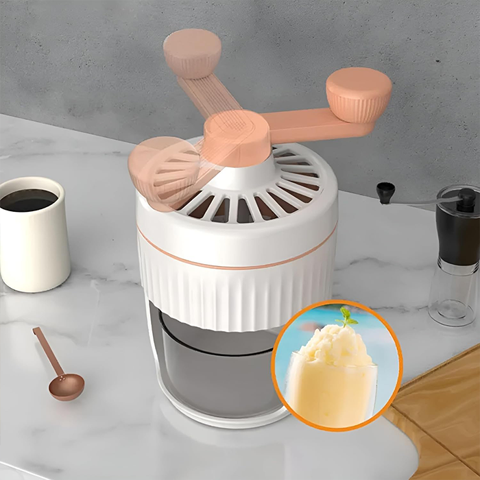 Manual ice crusher producing fine shaved ice texture inside transparent storage container Qatar