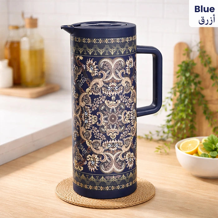 Blue stainless steel vacuum flask with intricate pattern on kitchen table Homesouq Qatar