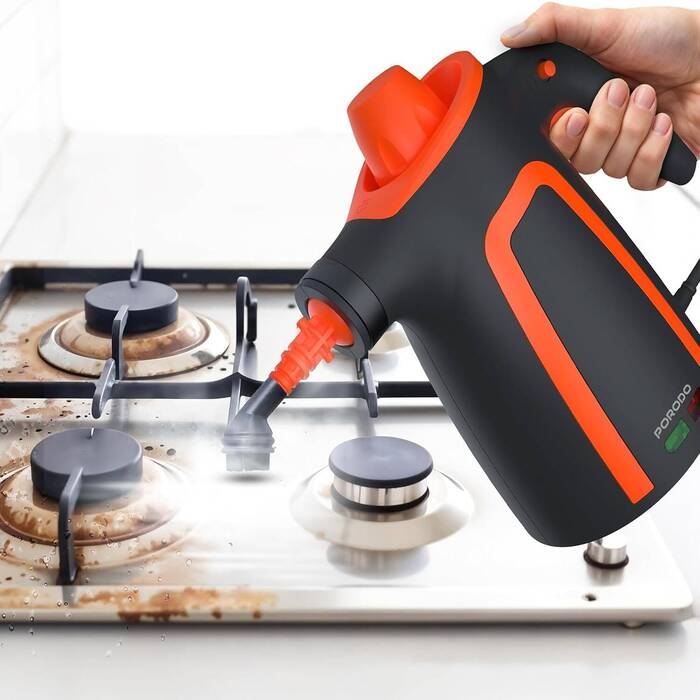 Porodo Lifestyle Steam cleaner removing grease from kitchen stove surface Qatar