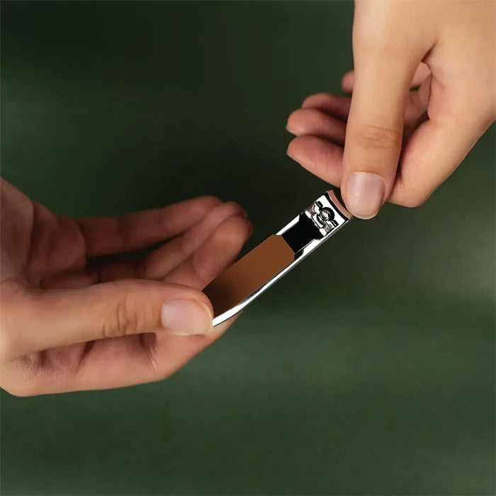 Close up of nail clipper being used for precise grooming and trimming Homesouq Qatar