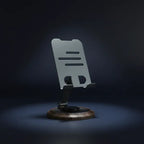Minimalist phone stand displayed in dark background highlighting premium build quality in Homesouq Qatar