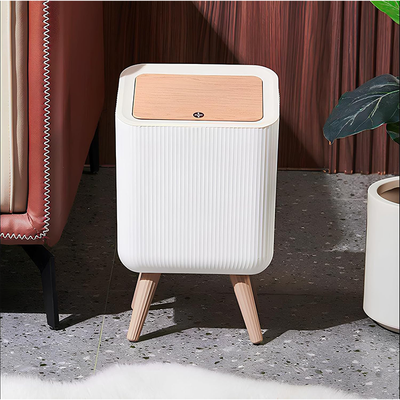 Decorative trash bin for living room with modern furniture setup in Qatar