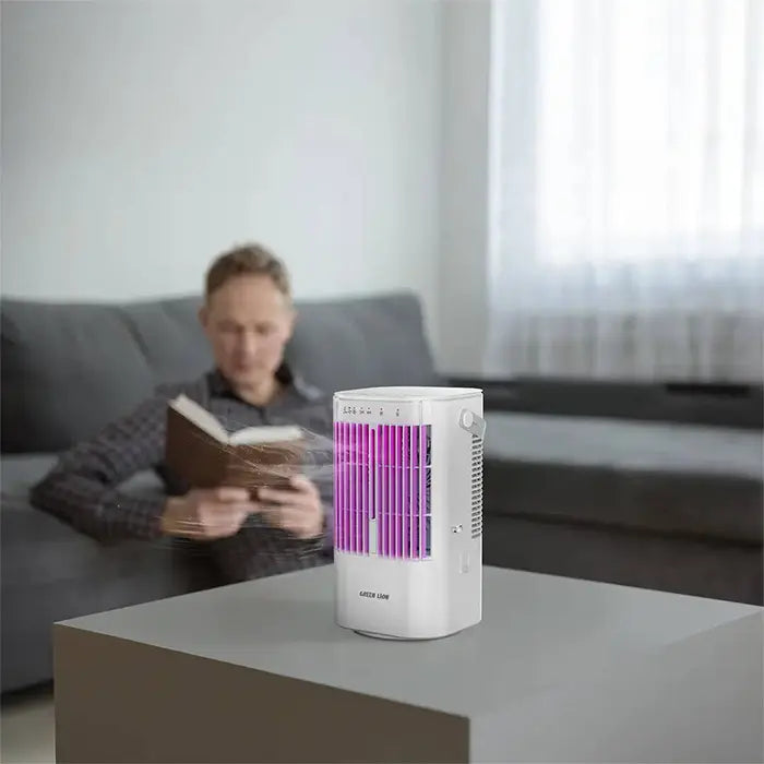 Green Lion cooler placed on table with person relaxing in background homesouq Qatar