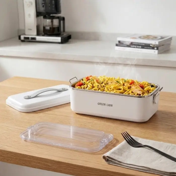 Electric lunch box portable food warmer with hot meal on wooden table in Homesouq Qatar