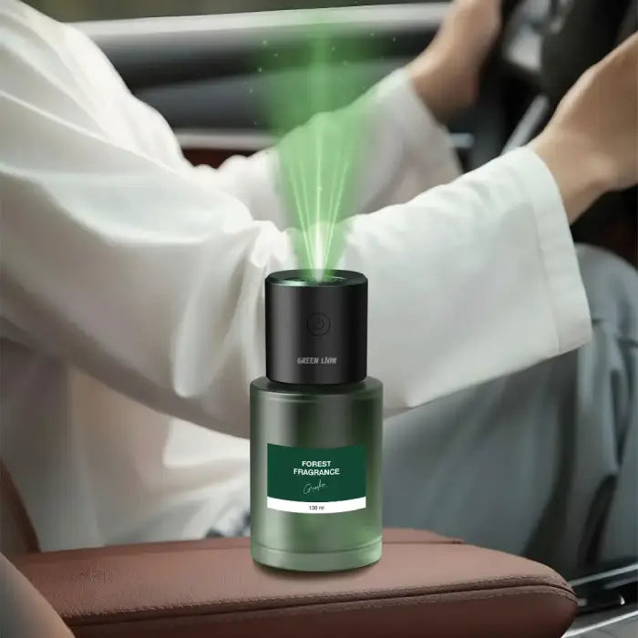 Compact aromatherapy device placed in car armrest emitting mist aromatherapy car diffuser Homesouq Qatar 