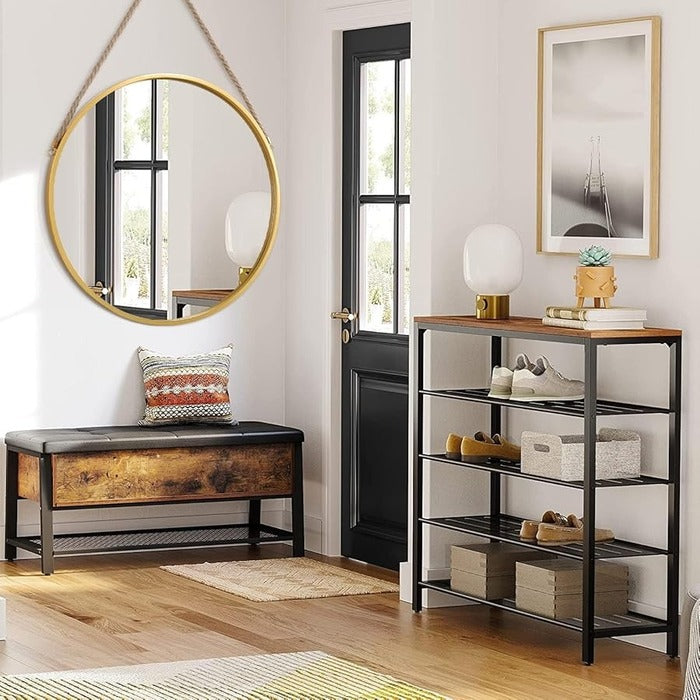 Hanging circle mirror above entryway bench with farmhouse style home decor interior Qatar