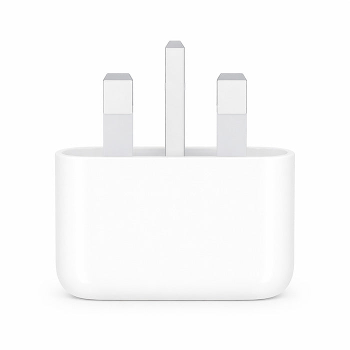 Apple USB-C 20W charger adapter being plugged into wall socket for iPhone Qatar