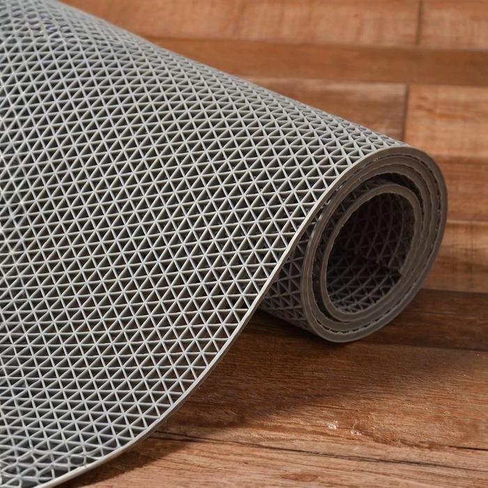 Rolled grey rubber mat with textured grip pattern for bathrooms Qatar