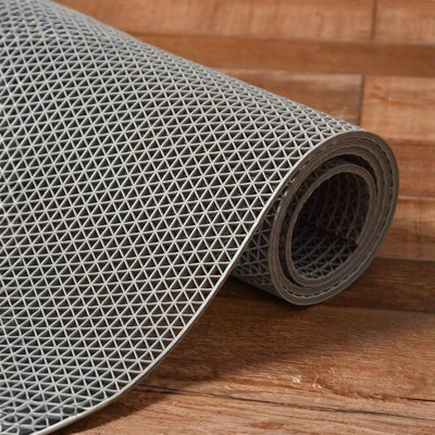 Rolled grey rubber mat with textured grip pattern for bathrooms Qatar