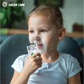 Green Lion portable nebulizer in use with child for respiratory care in Homesouq Qatar