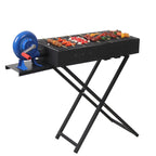 Versatile charcoal barbecue grill perfect for outdoor grilling and camping activities from Homesouq Qatar