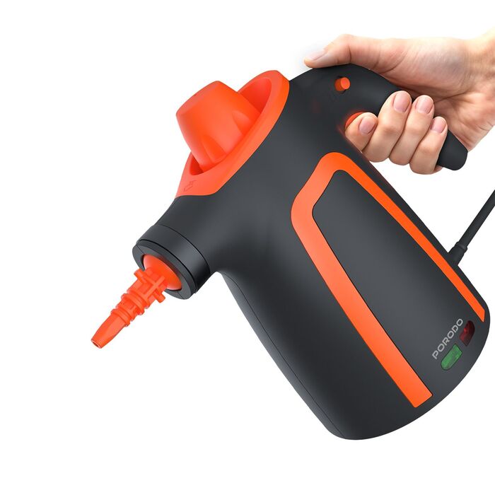 Handheld steam cleaner blasting steam on hard surface stains Qatar