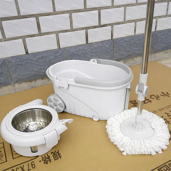 Dual drive spin wringing cleaning mop bucket showing wet and dry spinning modes for floor cleaning Qatar