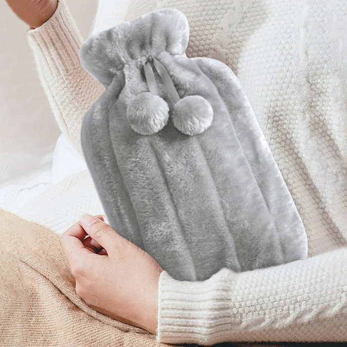 Hot water bag with soft cover for soothing pain relief and warmth – cozy, reusable, and perfect for everyday comfort.