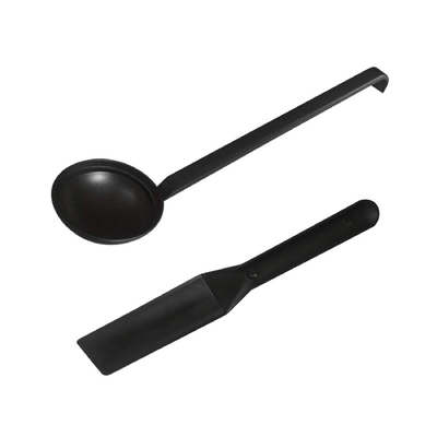 Cooking accessories for pancake maker including ladle and spatula next to appliance Qatar