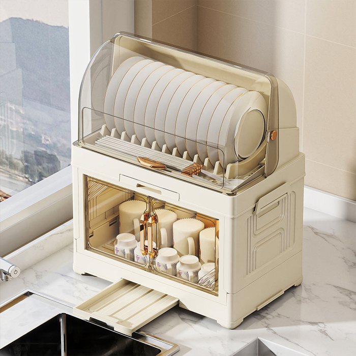 Covered dish drying rack with transparent lid, plate holder, cup storage, and bottom drain tray placed on a kitchen countertop near sink Homesouq Qatar