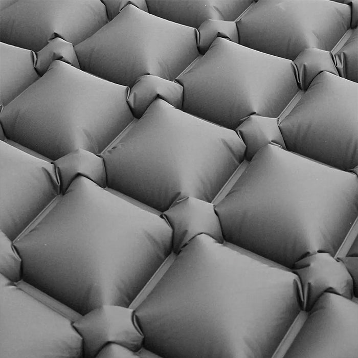 Portable air bed folded compactly for travel and camping in Qatar