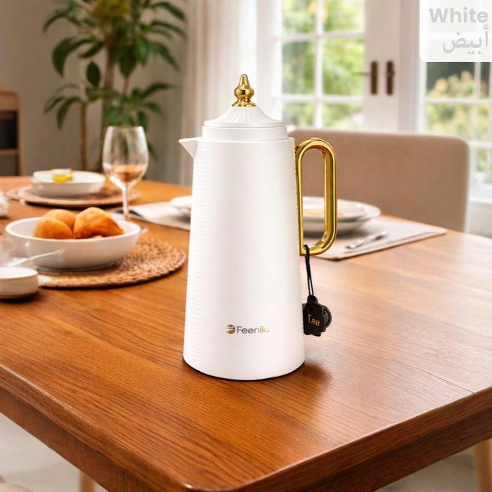 White vacuum flask on dining table, ideal for serving coffee and tea at home Qatar