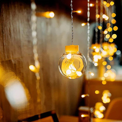 Single wishing ball LED light glowing warmly as decorative fairy light for indoor ambiance Qatar
