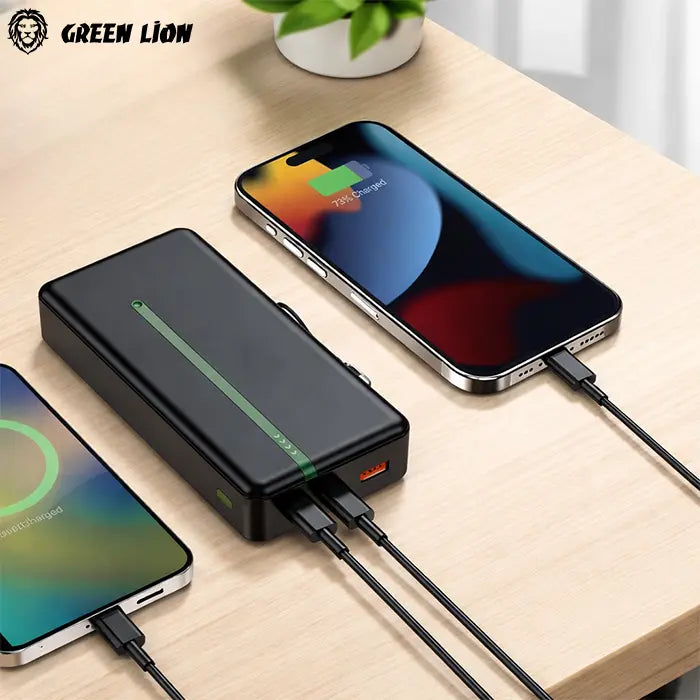Power bank charging two devices on desk with multiple ports Green Lion Homesouq Qatar