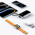 Portable Green Lion power bank charging multiple devices on desk setup Homesouq Qatar