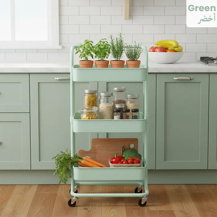 Green rolling storage trolley cart with 3 tiers holding vegetables and jars in kitchen Homesouq Qatar