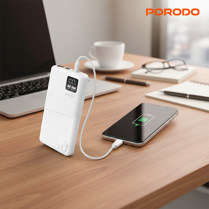 Porodo Blue 10000mAh power bank charging smartphone on desk with LED display fast charging portable charger Qatar