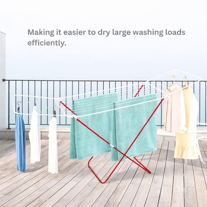 Outdoor laundry drying rack on balcony with colorful laundry and city view Qatar