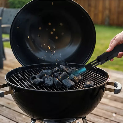 Green Lion torch lighter igniting charcoal grill outdoors in Qatar homesouq Qatar