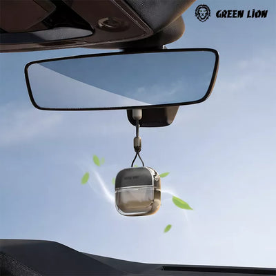 Green Lion car diffuser hanging from rearview mirror with fresh scent effect in car Qatar