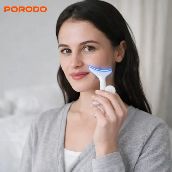porodo face massager being used on cheek showing real life usage in Homesouq Qatar