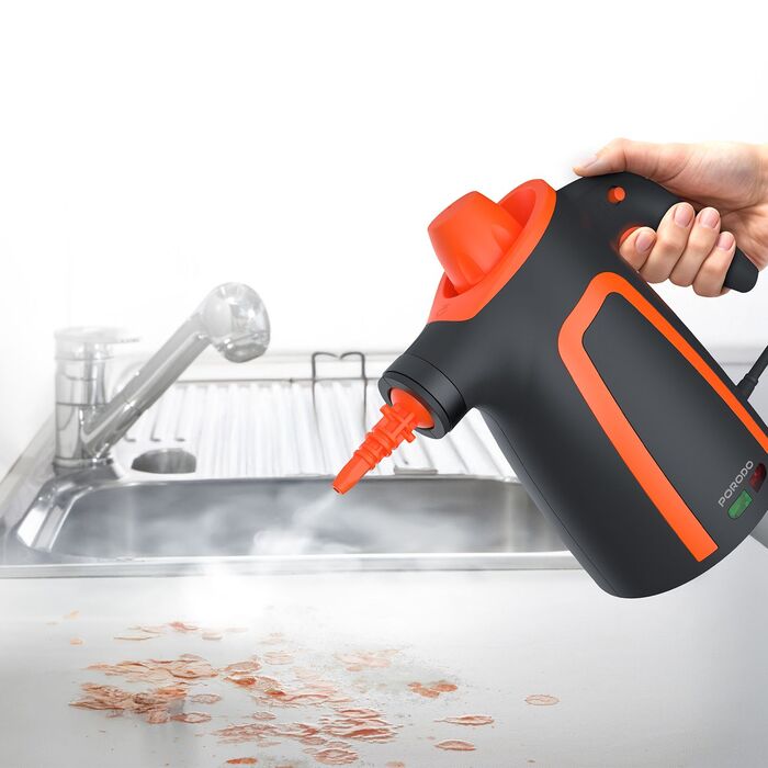 Steam cleaner sanitizing bathroom sink and surrounding area Qatar