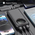 Power bank with digital display charging multiple smartphones simultaneously on desk homesouq Qatar