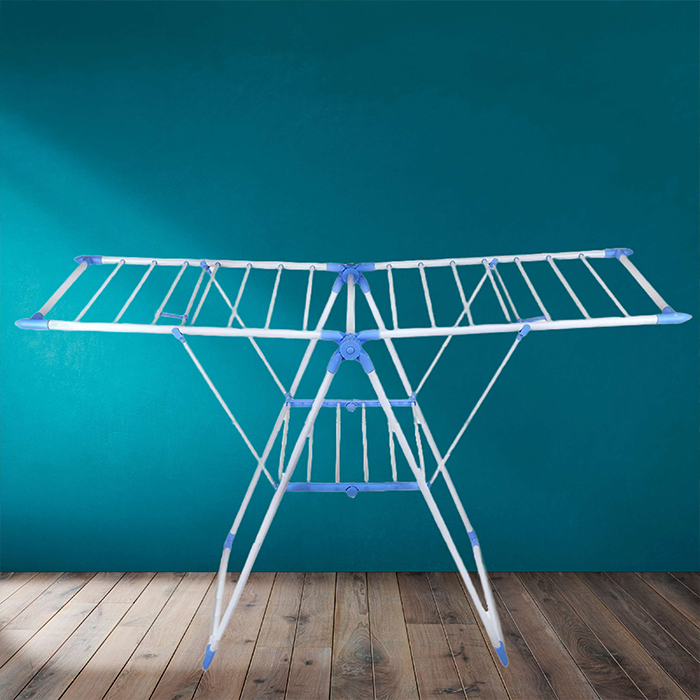 Heavy duty cloth drying stand placed indoors with wide drying rack wings for multiple garments Qatar