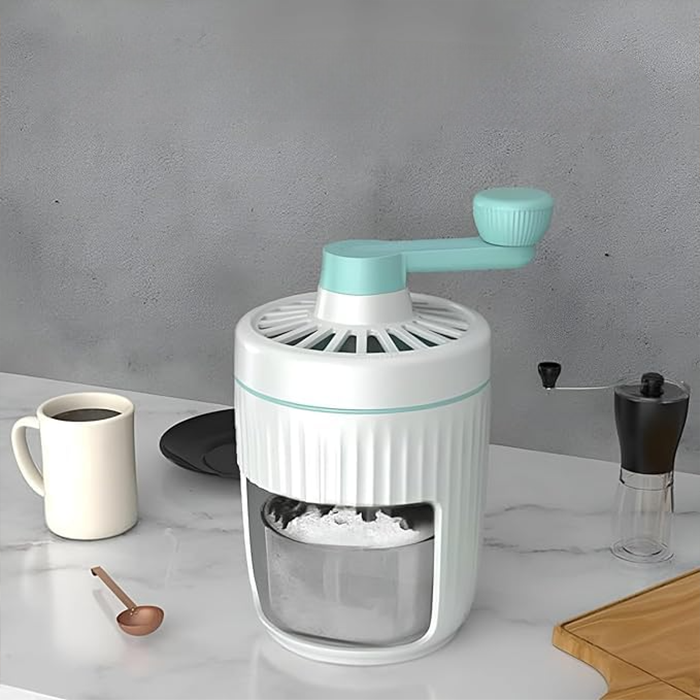 Manual ice grinder with mint handle on modern countertop, compact ice crusher for kitchen use Qatar