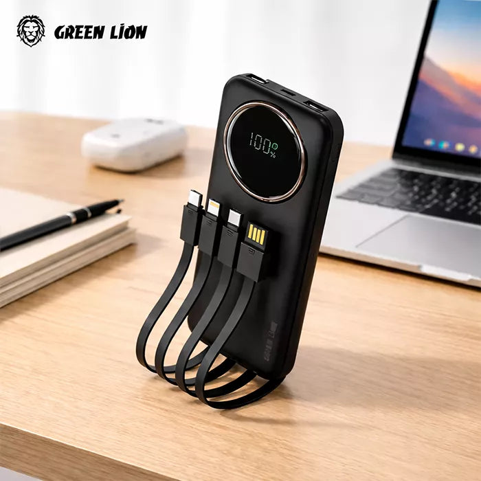 Green Lion power bank placed on desk with laptop showing real usage scenario in homesouq Qatar