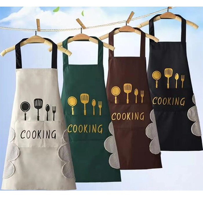 Assorted color chef aprons hanging showing waterproof unisex design Qatar
