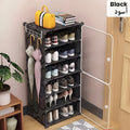 Multi-layer black shoe rack cabinet with doors for everyday shoe organization Qatar