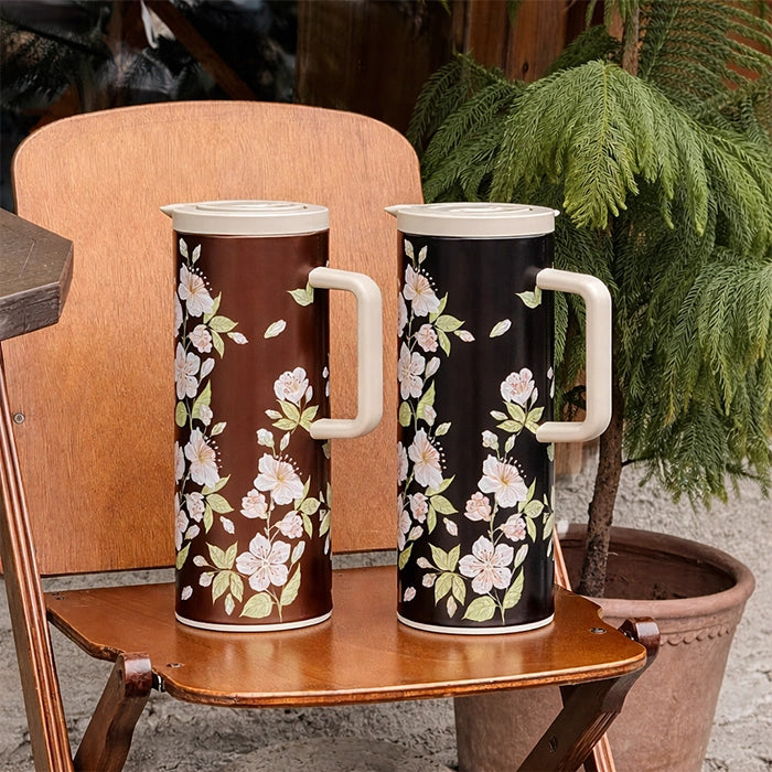 Two stainless steel vacuum flask bottles displayed on chair outdoor setup Homesouq Qatar